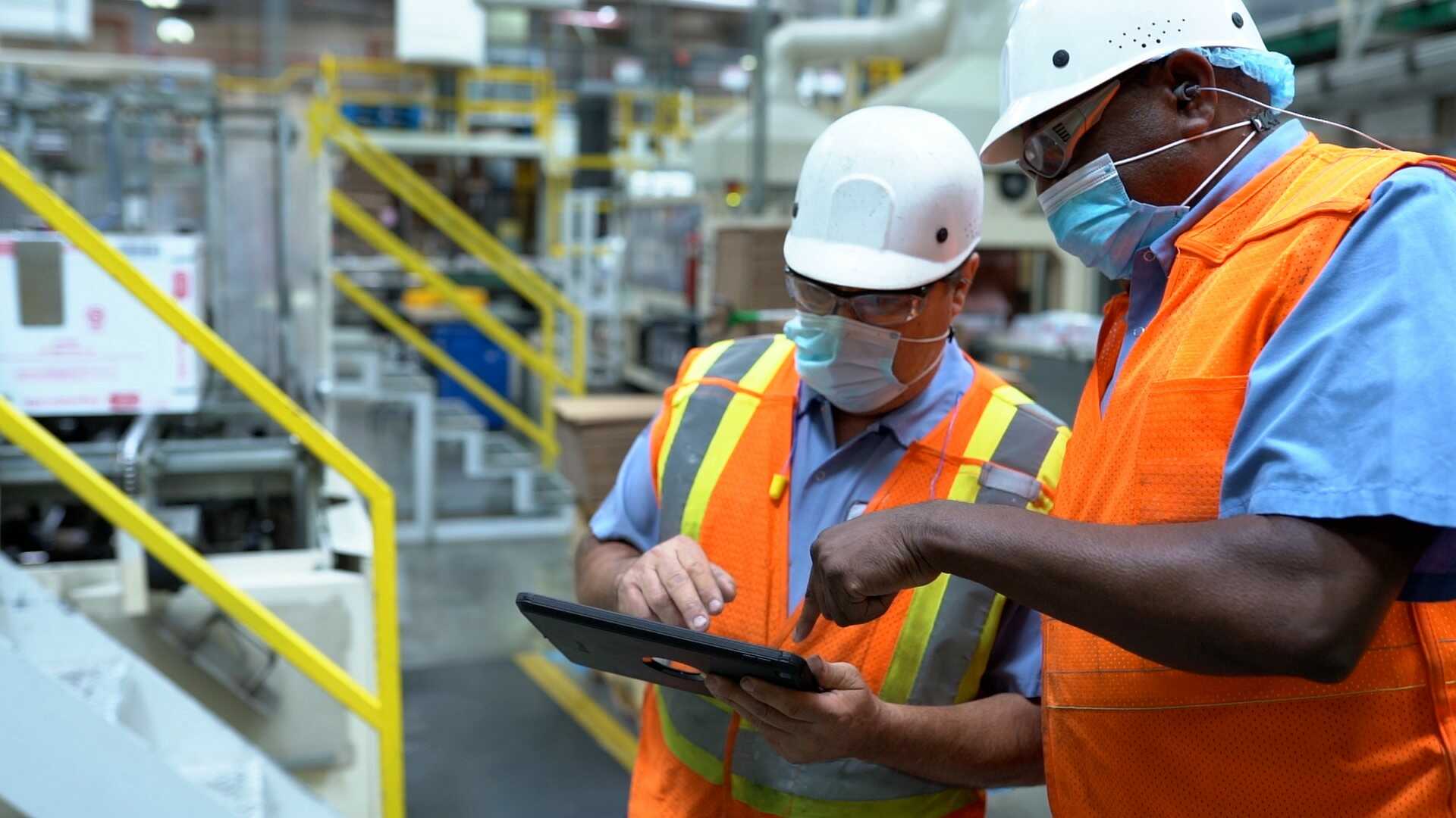 Nestlé factory workers collaborating