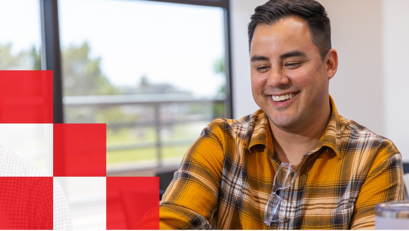 purina worker smiling while working