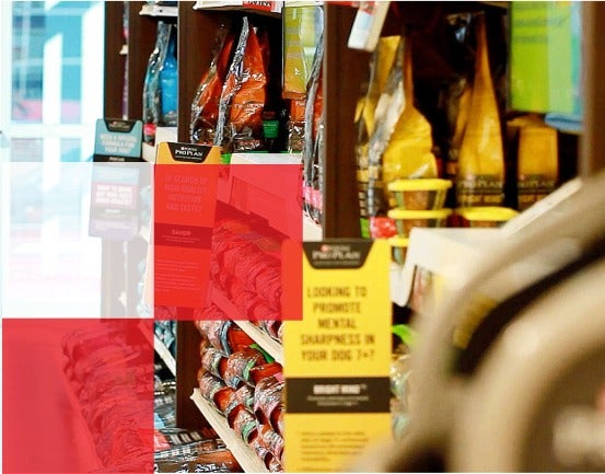 Purina products on shelves in store