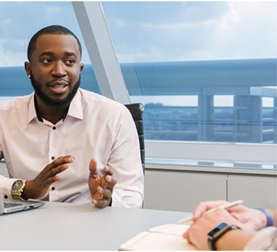 Man talking during a meeting in a conference room