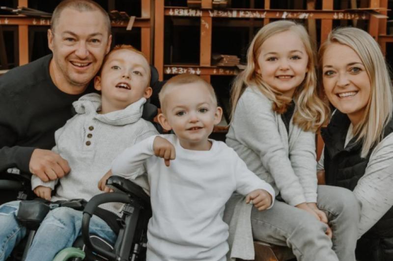 family with child in wheelchair